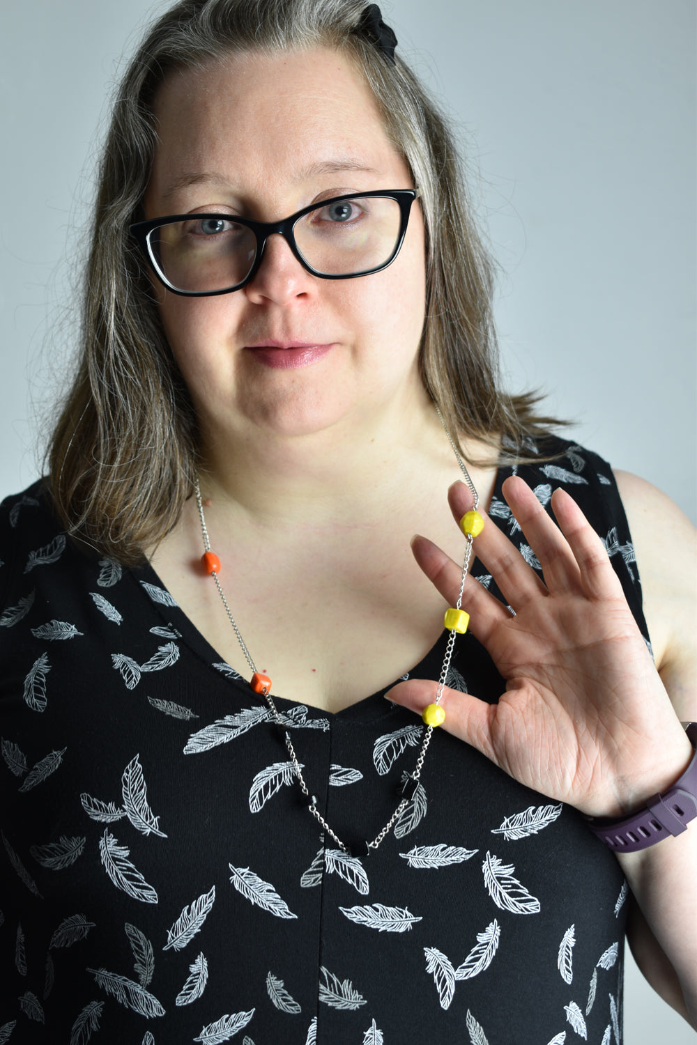 Asymmetrical Orange, Black, and Yellow Beaded Necklace in Silver