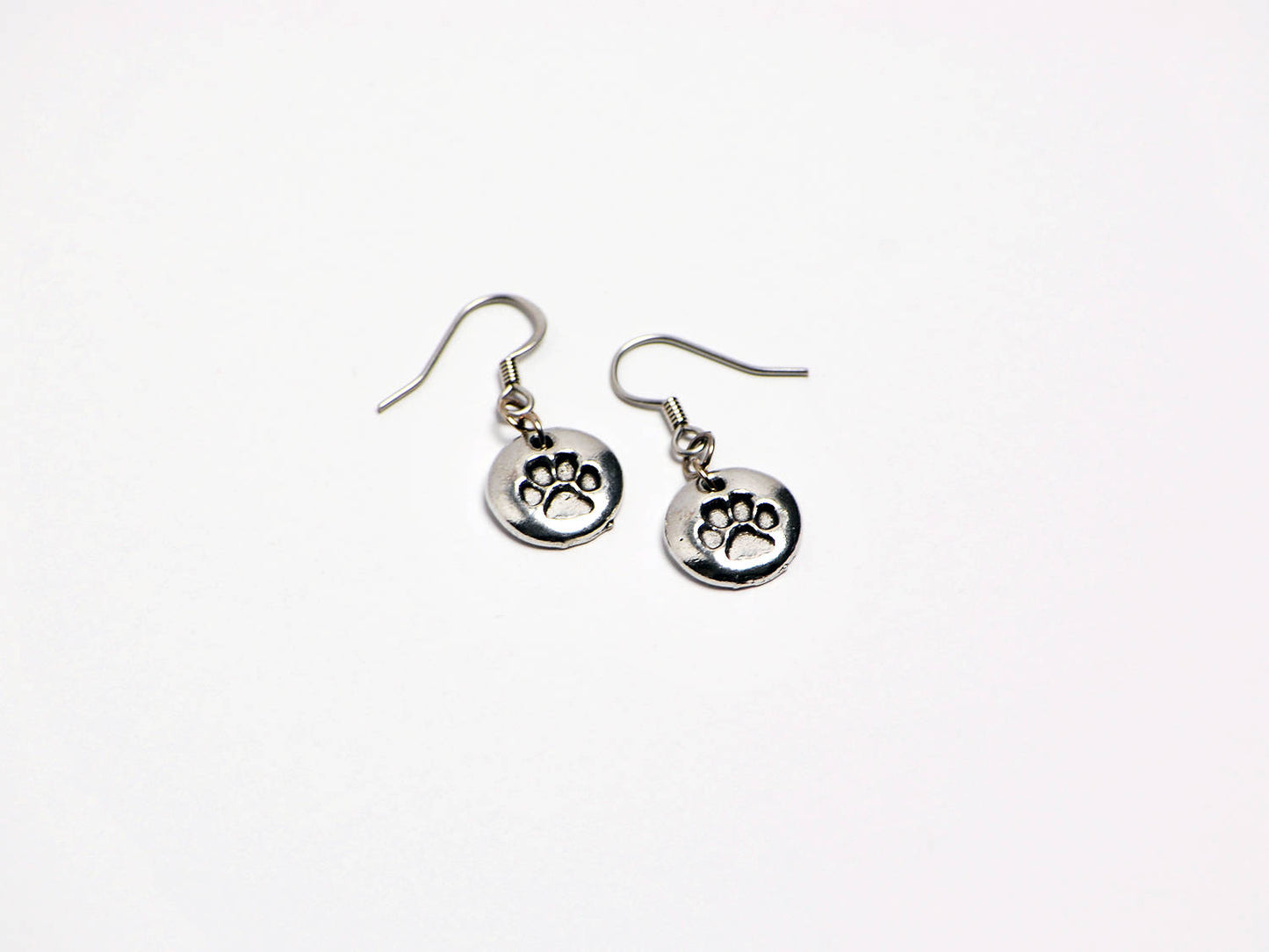 Paw Print Earrings in Silver
