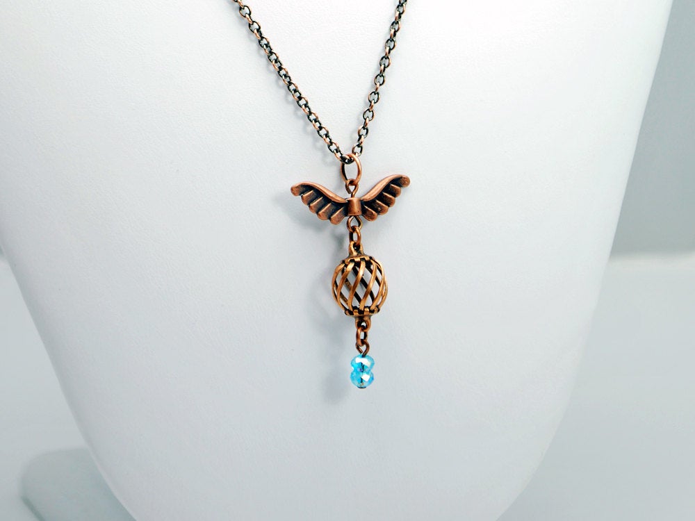 Uncaged Bird Necklace in Antique Copper and Blue