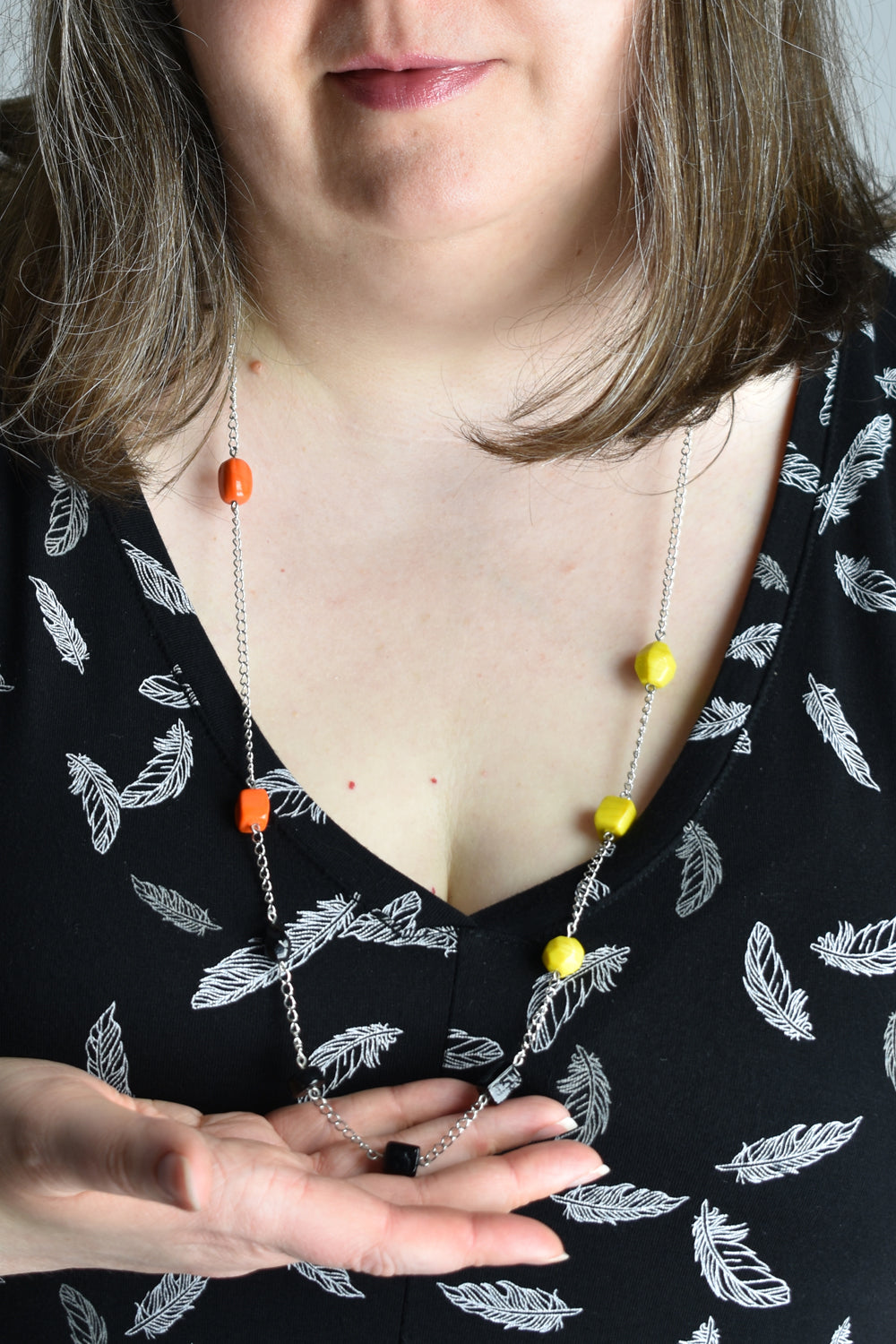Asymmetrical Orange, Black, and Yellow Beaded Necklace in Silver