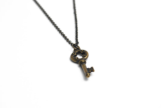 Quatrefoil Key Necklace in Antique Brass