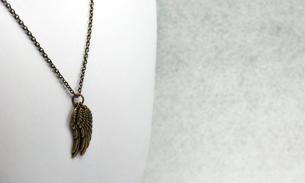 Wings Necklace in Antique Brass